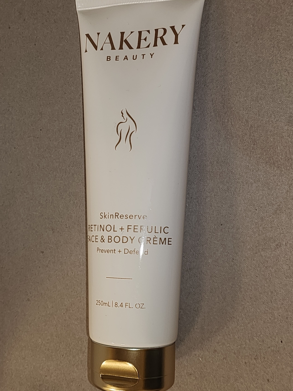 Nakery Beauty SkinReserve Retinol + Ferulic Face & Body Crème — White/Gold